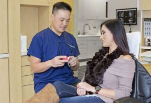 Patient Education 1
Dr. Anthony Nguyen, dentist in San Ramon, consulting with a patient and explaining a dental model during an appointment at Pro Smile Dental Care